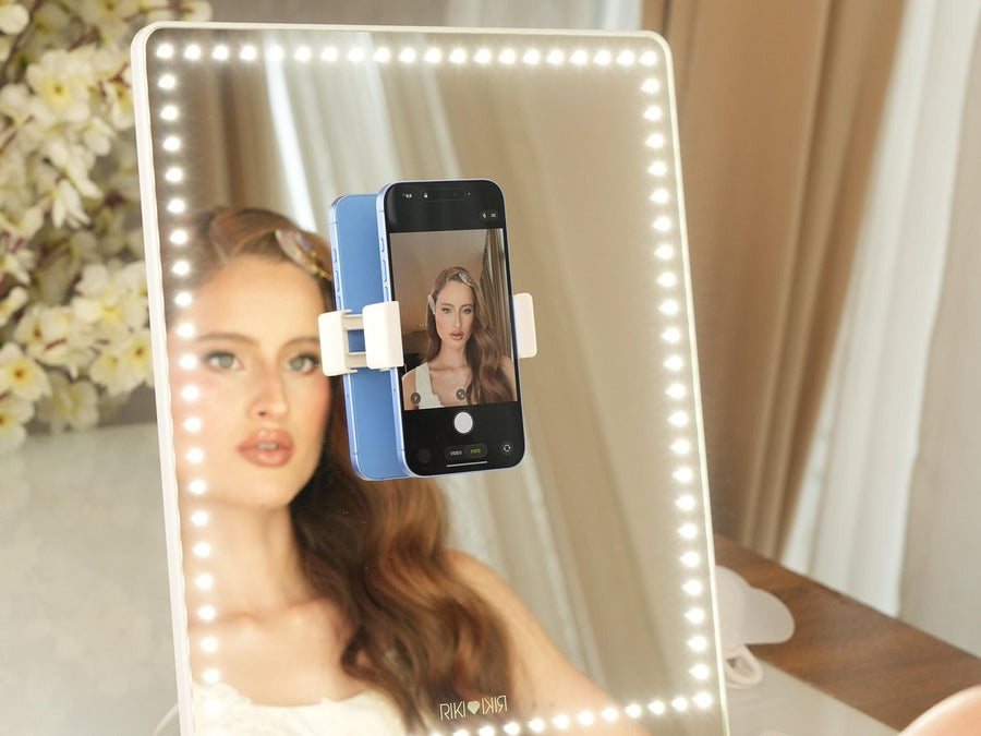 Bridal makeup artist filming with the magnetic phone holder on RIKI PRETTY