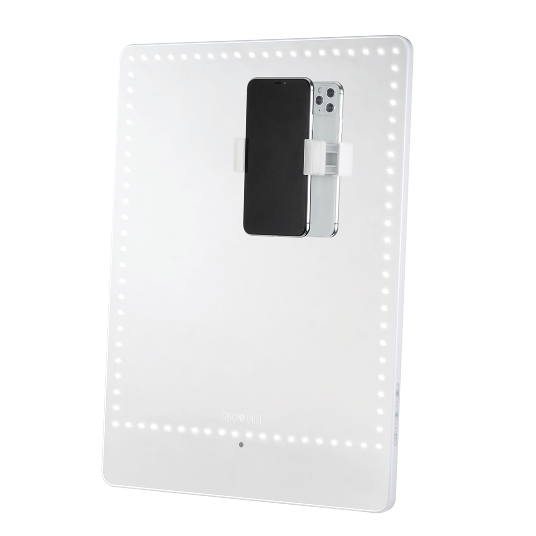RIKI PRETTY mirror with new wall-mounting feature for a design-forward look and phone clip.