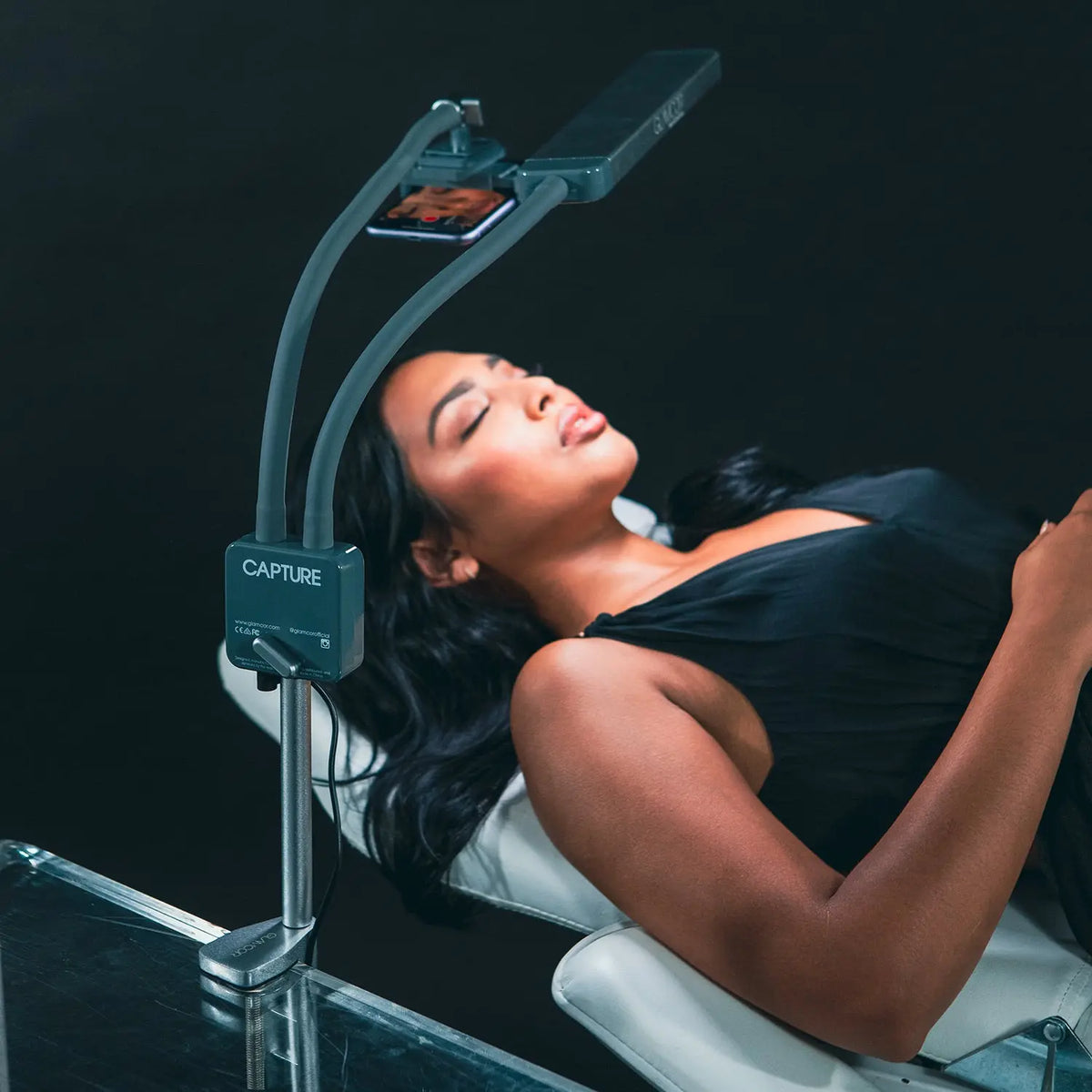 CAPTURE bending LED light beside a lash treatment bed