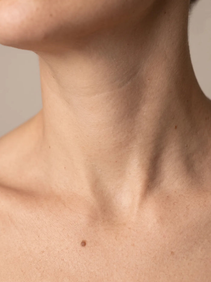 Neck skin after LED treatment with fine lines and creases visibly softened