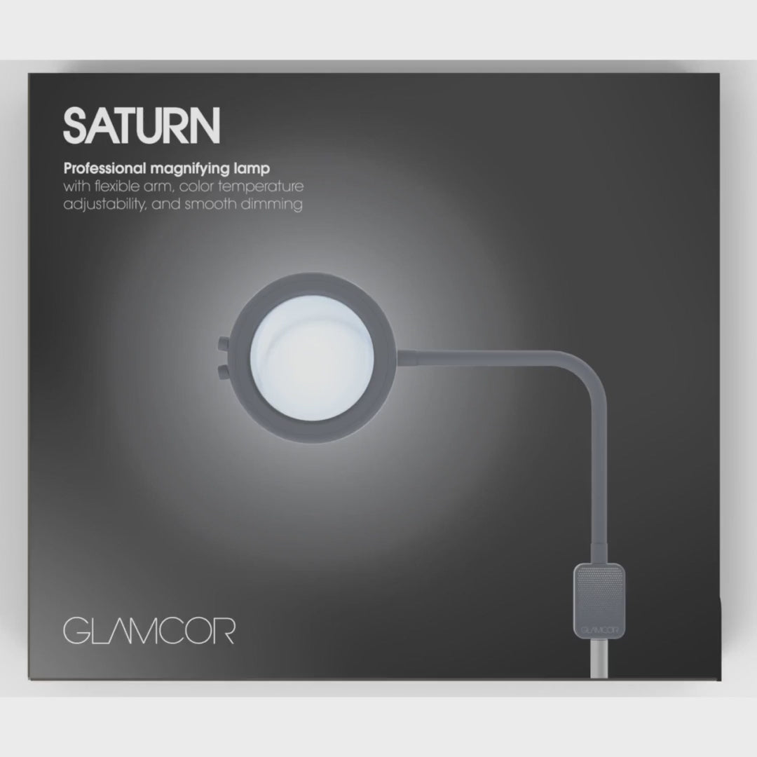 Load video: GLAMCOR SATURN magnifying lamp with flat base, featuring flexible positioning and HD LED lighting for estheticians and skincare professionals.