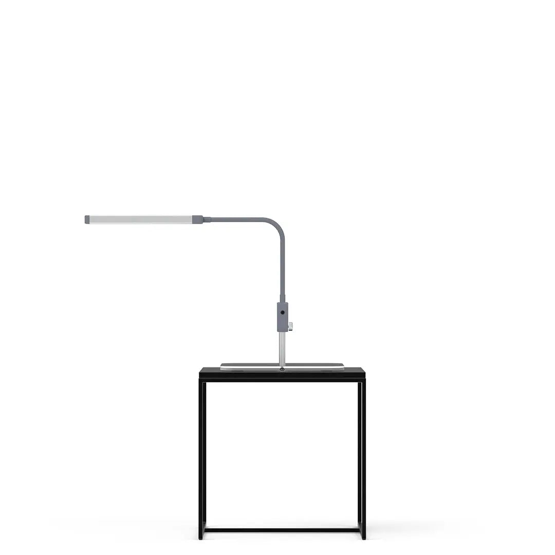Square base of the GLAMCOR Reveal Light Only, designed for stability and optimal positioning during beauty services.